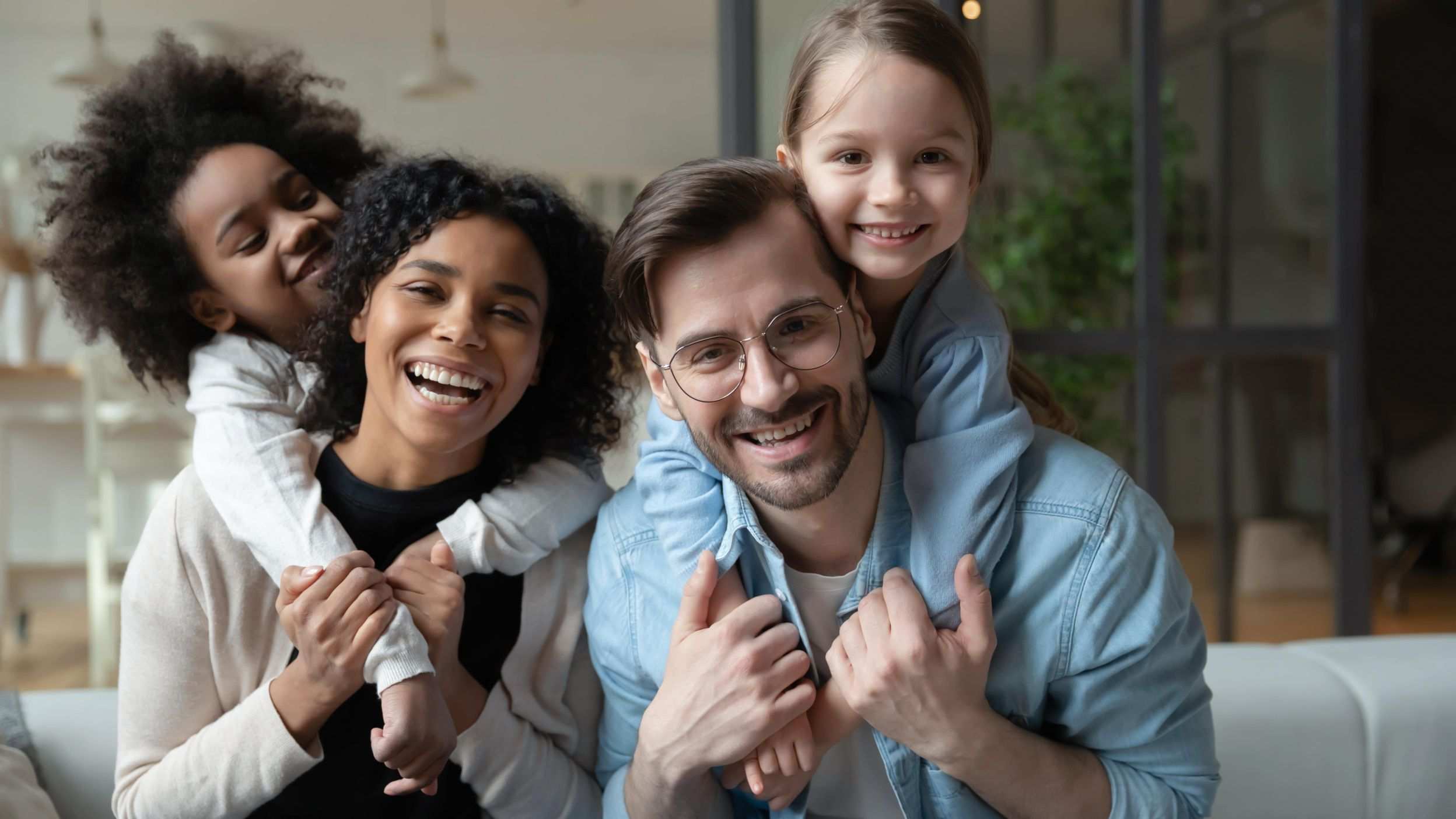Happy family sitting on a couch