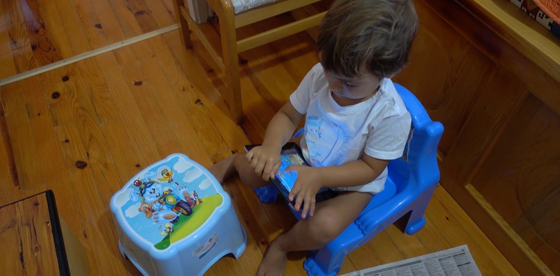 Child sitting on a chair